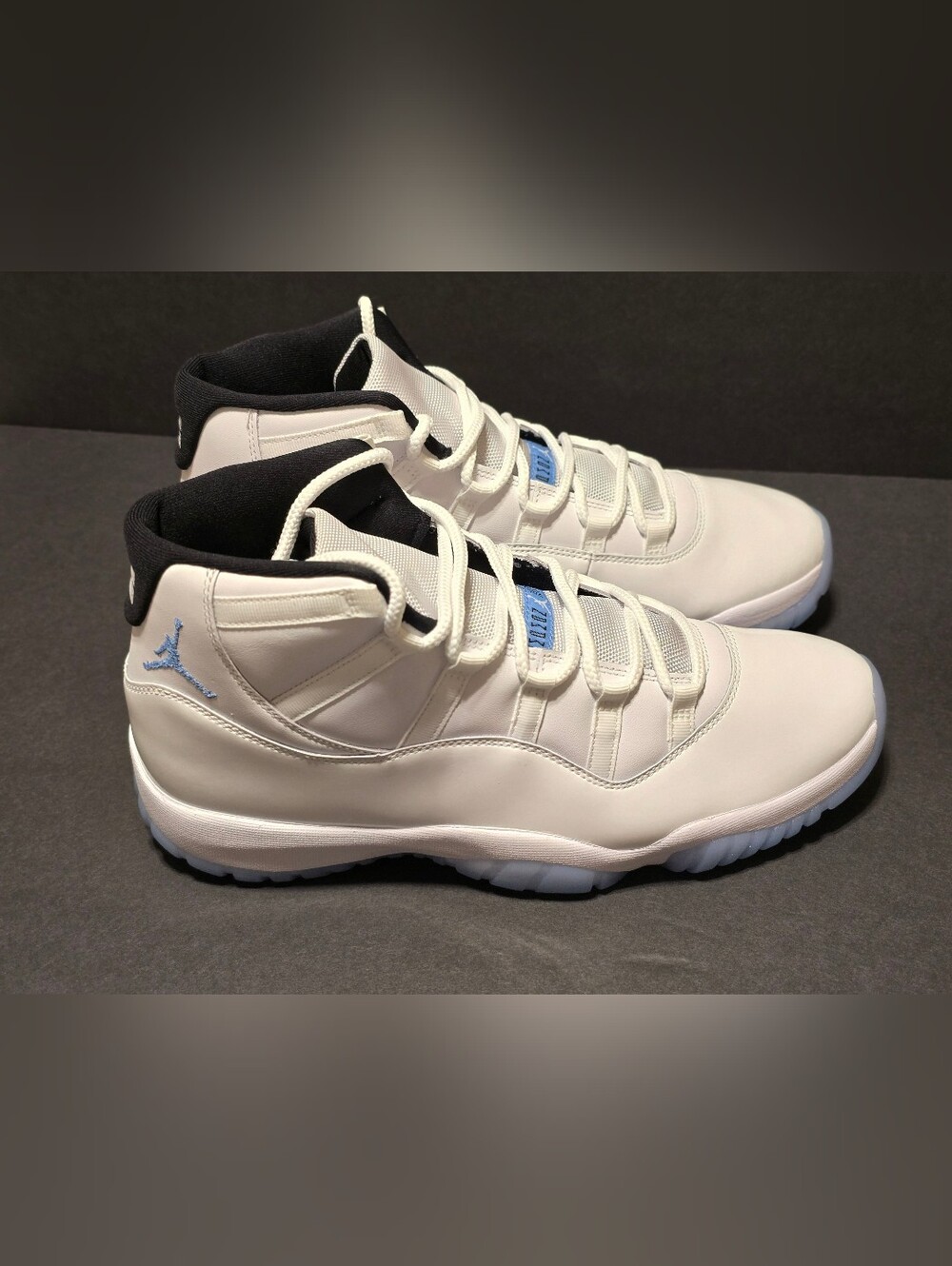 Nike White and Black High-Top Basketball Sneakers with Light Blue Jumpman
